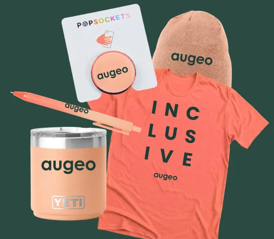 Branded merchandise — a tumbler, a beanie, a tee and a phone grip.